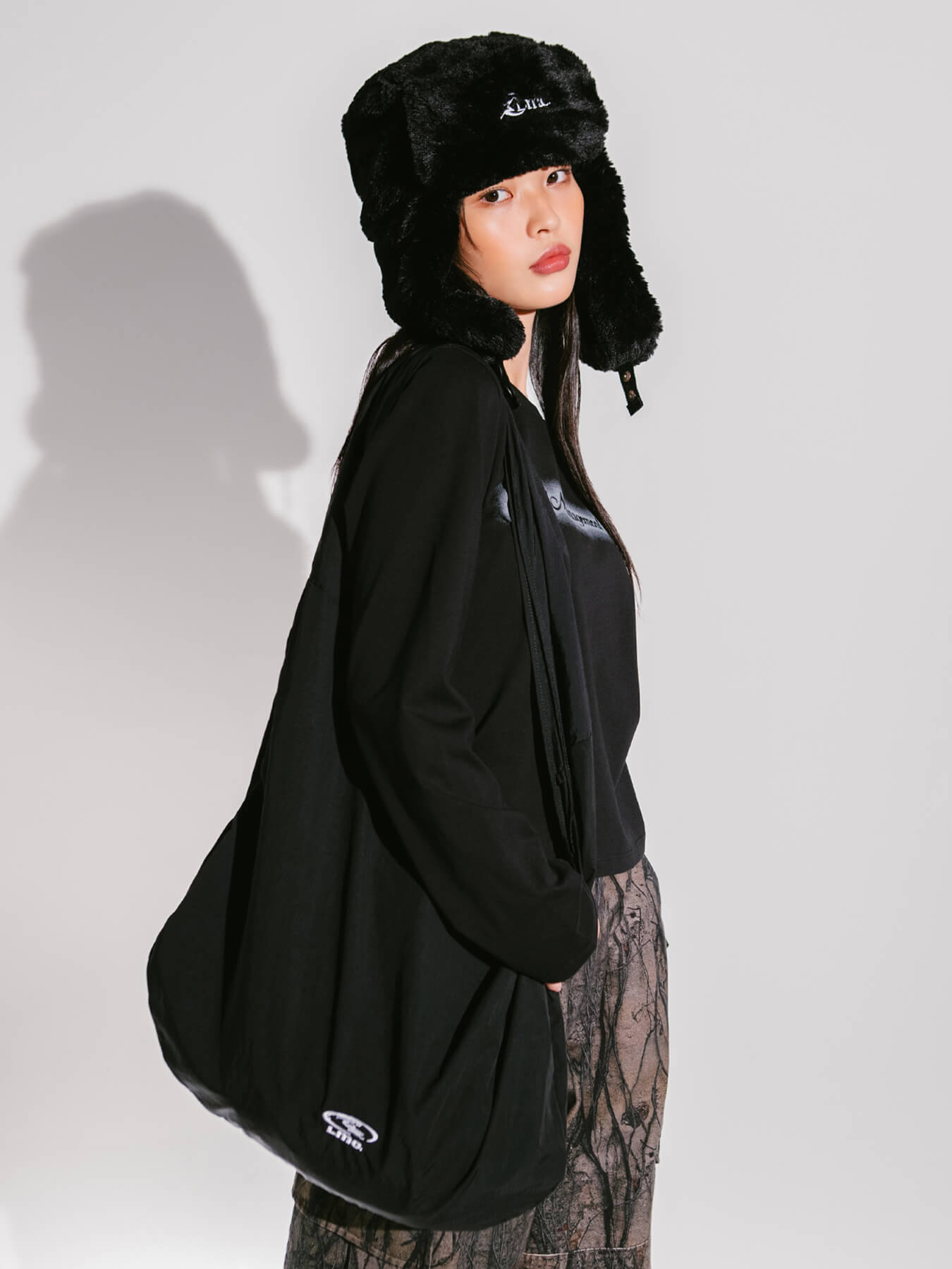 Сумка OVAL GLOBE CURVED CROSS